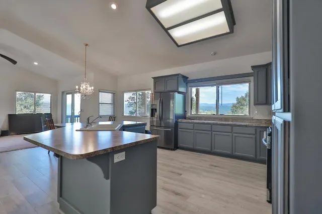 a kitchen with sink and window