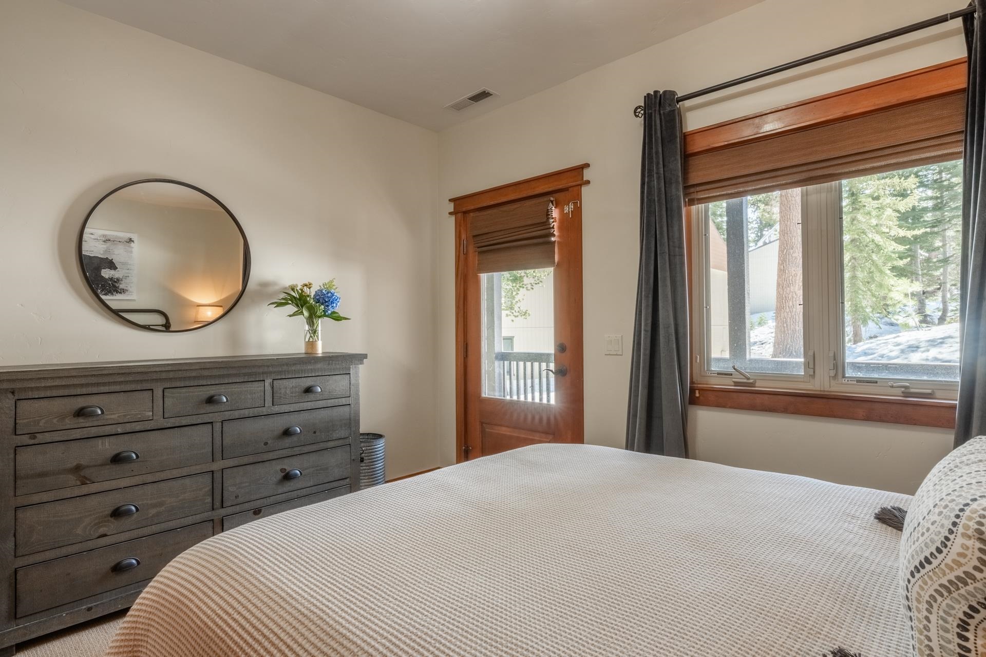 125 Davison Road, Unit 1 Mammoth Lakes, CA 93546 - Photo 40 of 46 a bedroom with a bed and a large window
