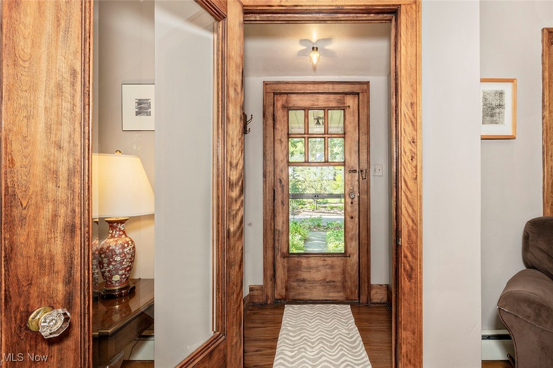 2985 Coleridge Road Cleveland, OH 44118 - Photo 6 of 46 Entryway with wood finished floors and a baseboard heating unit