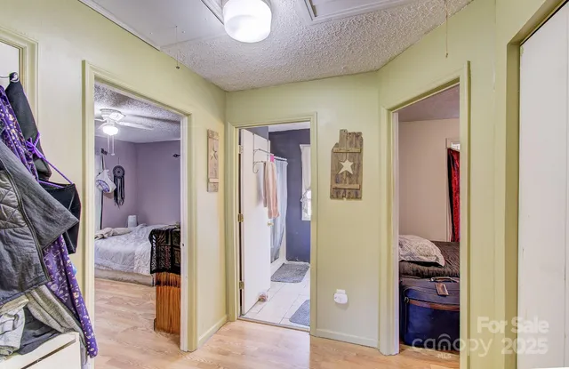 a bedroom with a bed and a desk