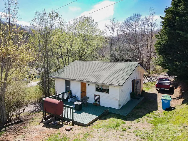 a view of a patio in the backyard