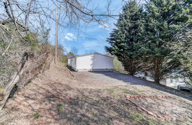 an aerial view of residential house with outdoor space