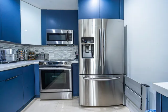 a bathroom with a sink toilet vanity and shower