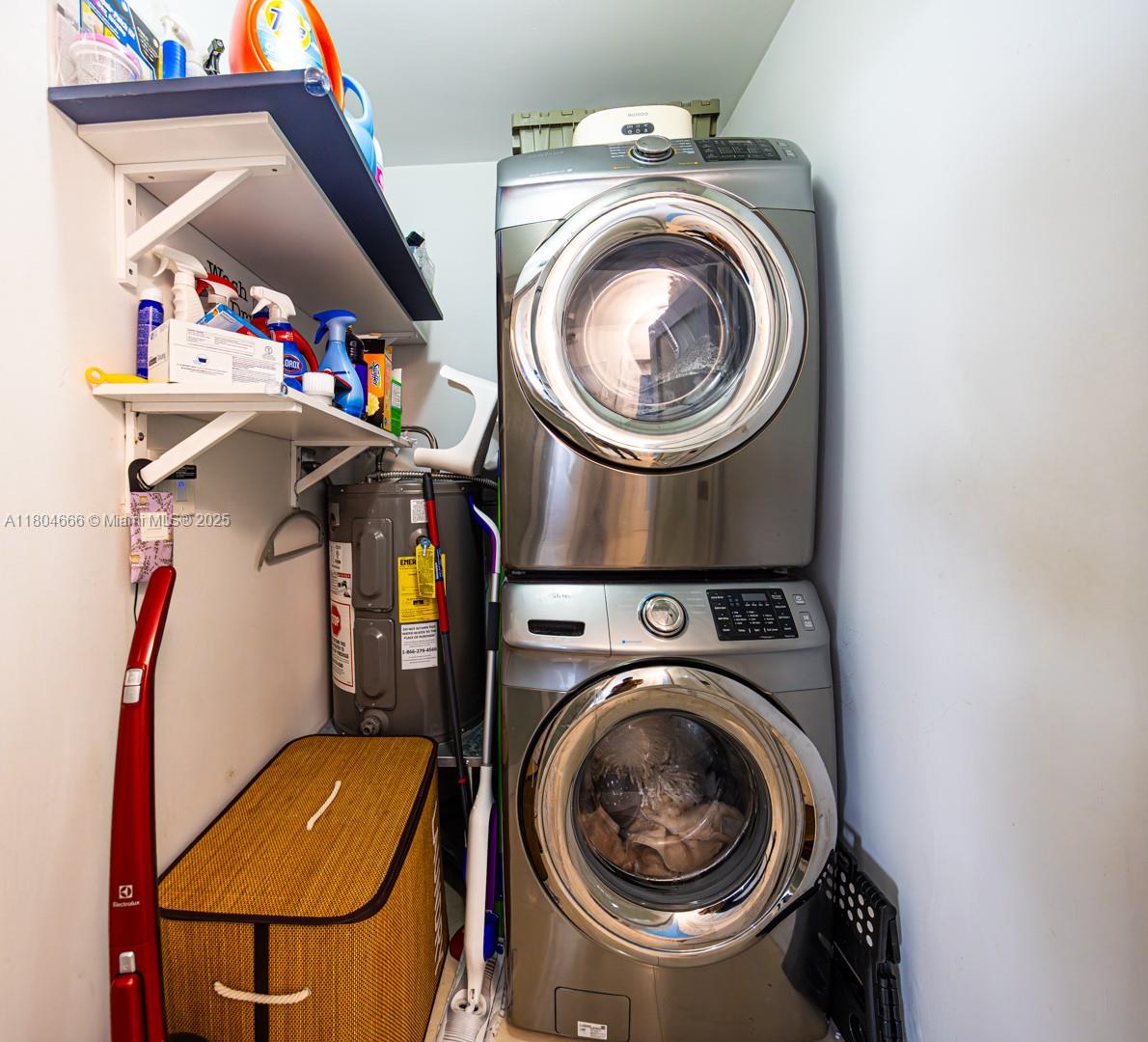 6950 Northwest 168th Street Hialeah, FL 33015 - Photo 16 of 28 a utility room with dryer and washer