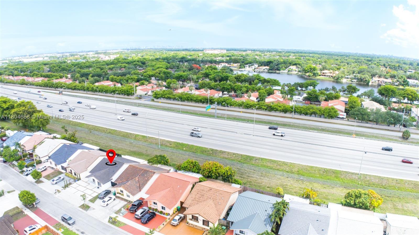 6950 Northwest 168th Street Hialeah, FL 33015 - Photo 3 of 28 a view of swimming pool from a balcony