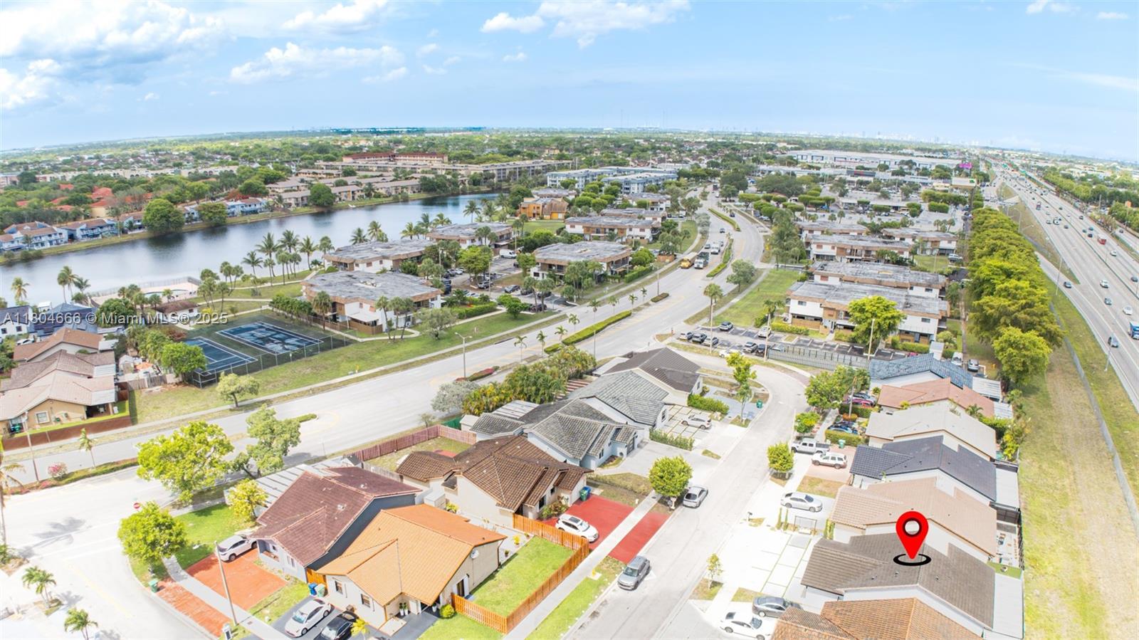 6950 Northwest 168th Street Hialeah, FL 33015 - Photo 4 of 28 an aerial view of a city