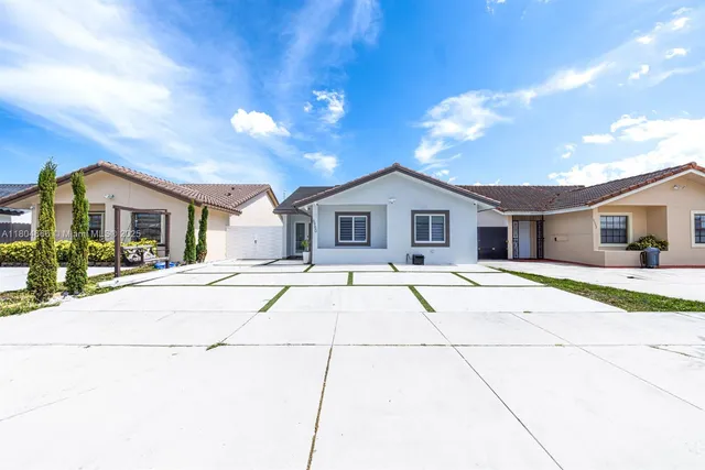 a house view with a outdoor space