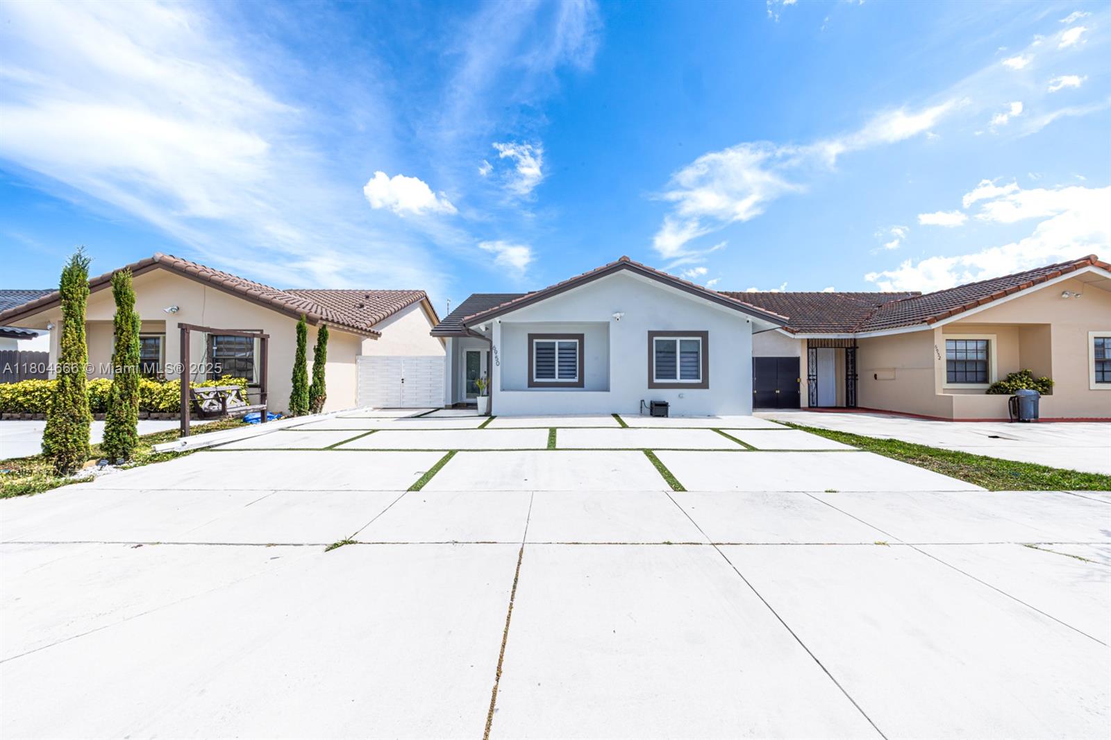 6950 Northwest 168th Street Hialeah, FL 33015 - Photo 5 of 28 a house view with a outdoor space