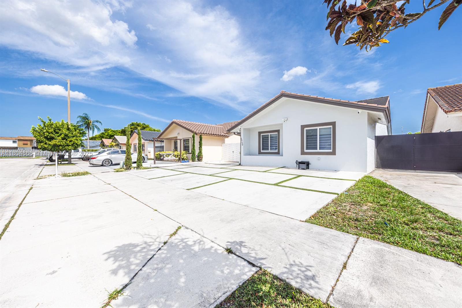 6950 Northwest 168th Street Hialeah, FL 33015 - Photo 7 of 28 a view of house with a outdoor space