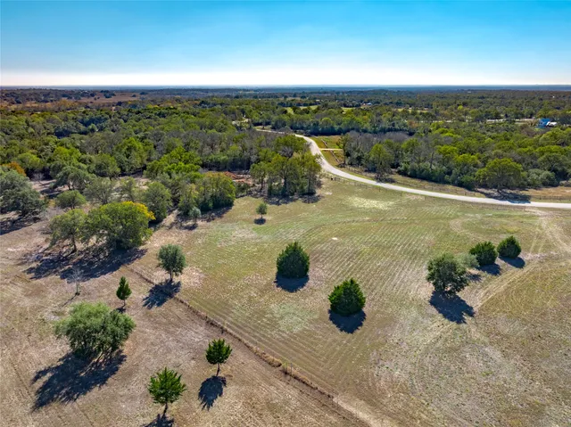 a view of an ocean and mountain