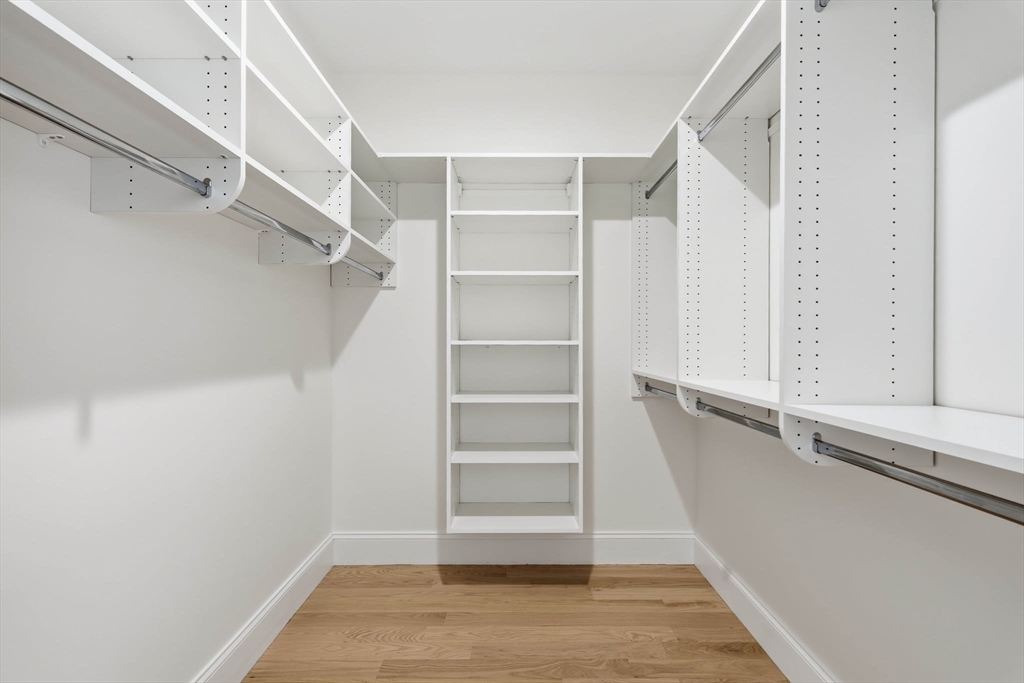 16 Couture Way Middleton, MA 01949 - Photo 20 of 36 a view of walk in closet with empty racks