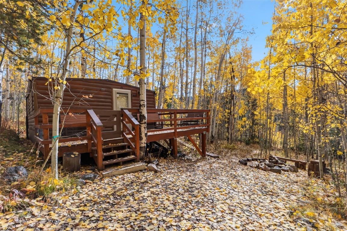5364 Meadow Creek Road Tabernash, CO 80478 - Photo 1 of 30 a view of a chairs and table in backyard