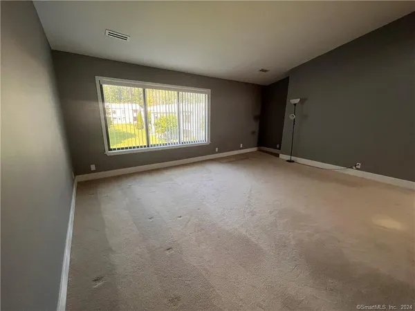 an empty room with a window