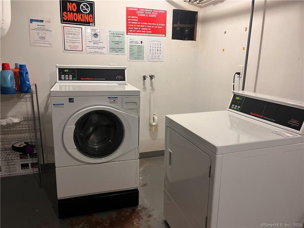 60 Olcott Way, Unit 60 Ridgefield, CT 06877 - Photo 24 of 31 a utility room with dryer and washer