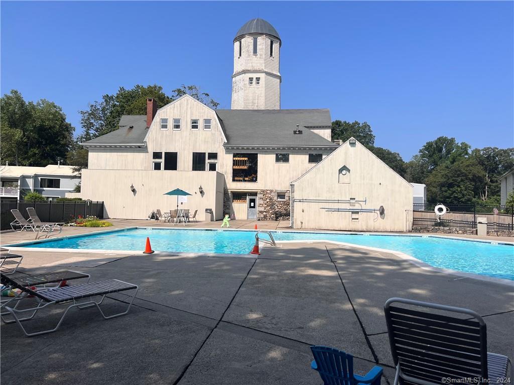 60 Olcott Way, Unit 60 Ridgefield, CT 06877 - Photo 28 of 31 a view of a outdoor space with porch and entertaining space