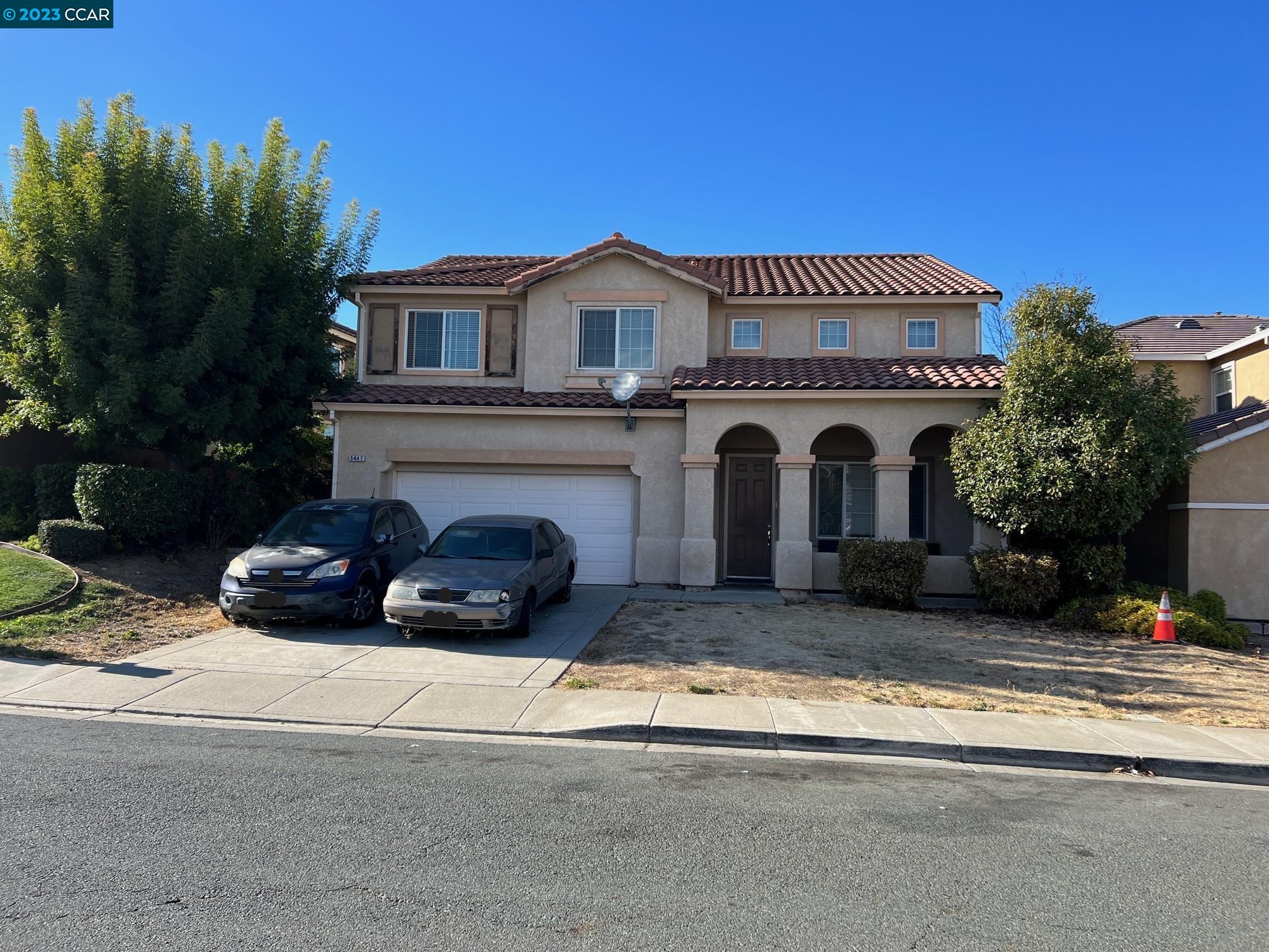 a view of a house with a patio
