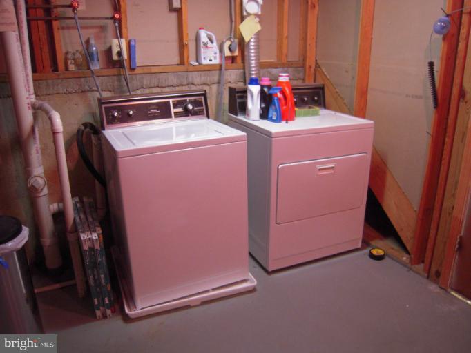 5478 Stavendish Street Burke, VA 22015 - Photo 25 of 30 a utility room with dryer and washer