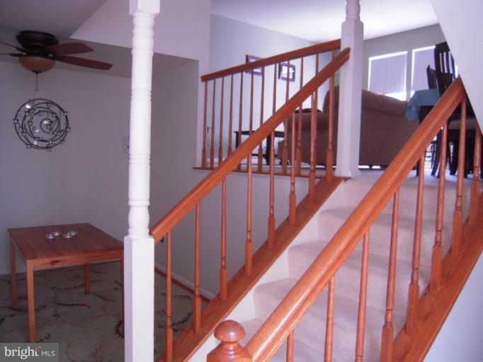 5478 Stavendish Street Burke, VA 22015 - Photo 4 of 30 a view of entryway with wooden floor
