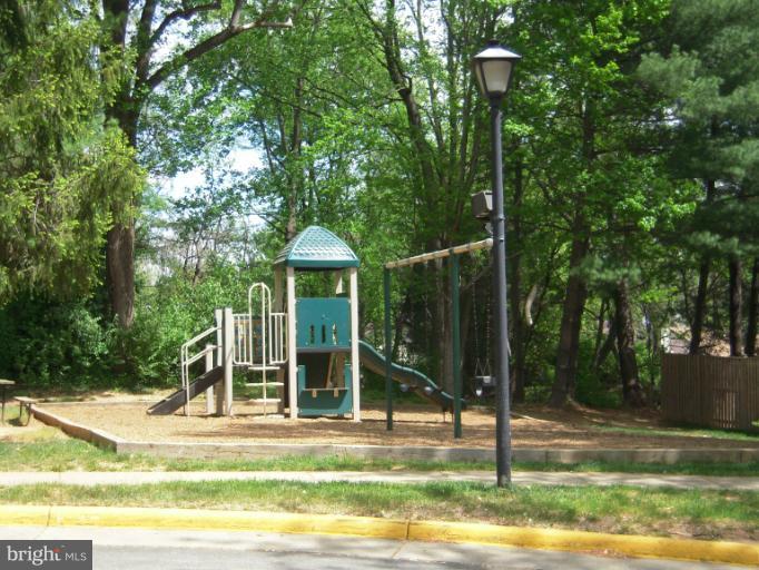 5478 Stavendish Street Burke, VA 22015 - Photo 5 of 30 a view of a house with backyard and trees