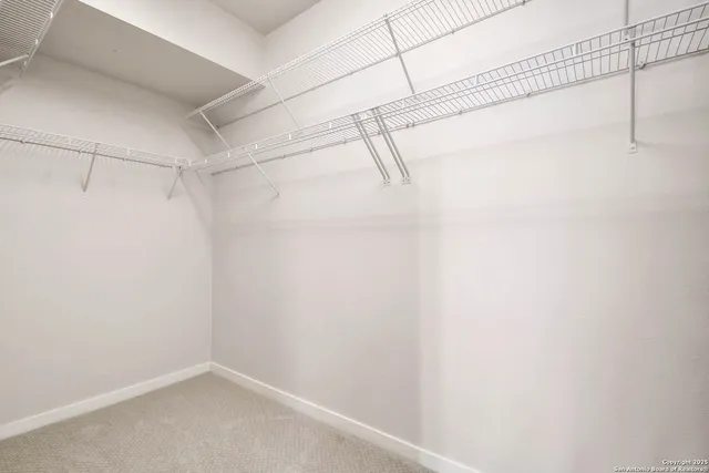 a view of a room with racks on the wall