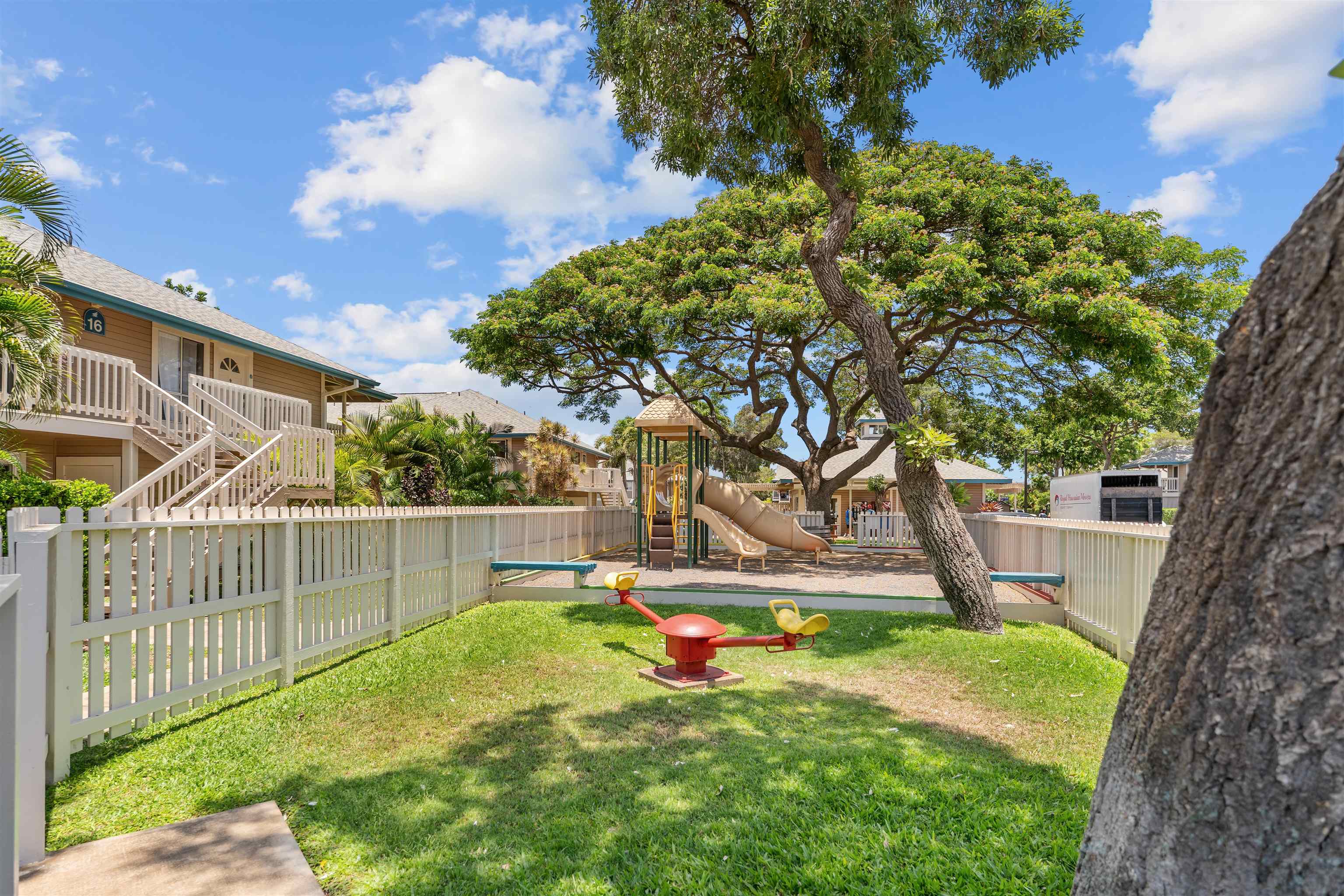 480 Kenolio Road, Unit 1203 Kihei, HI 96753 - Photo 15 of 17 a view of backyard with swimming pool