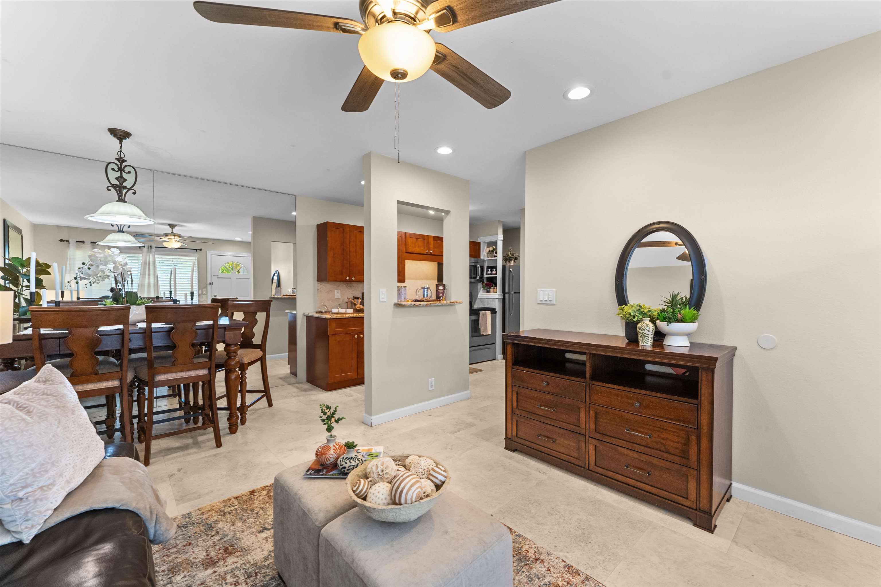 480 Kenolio Road, Unit 1203 Kihei, HI 96753 - Photo 4 of 17 a view of a dining room with furniture
