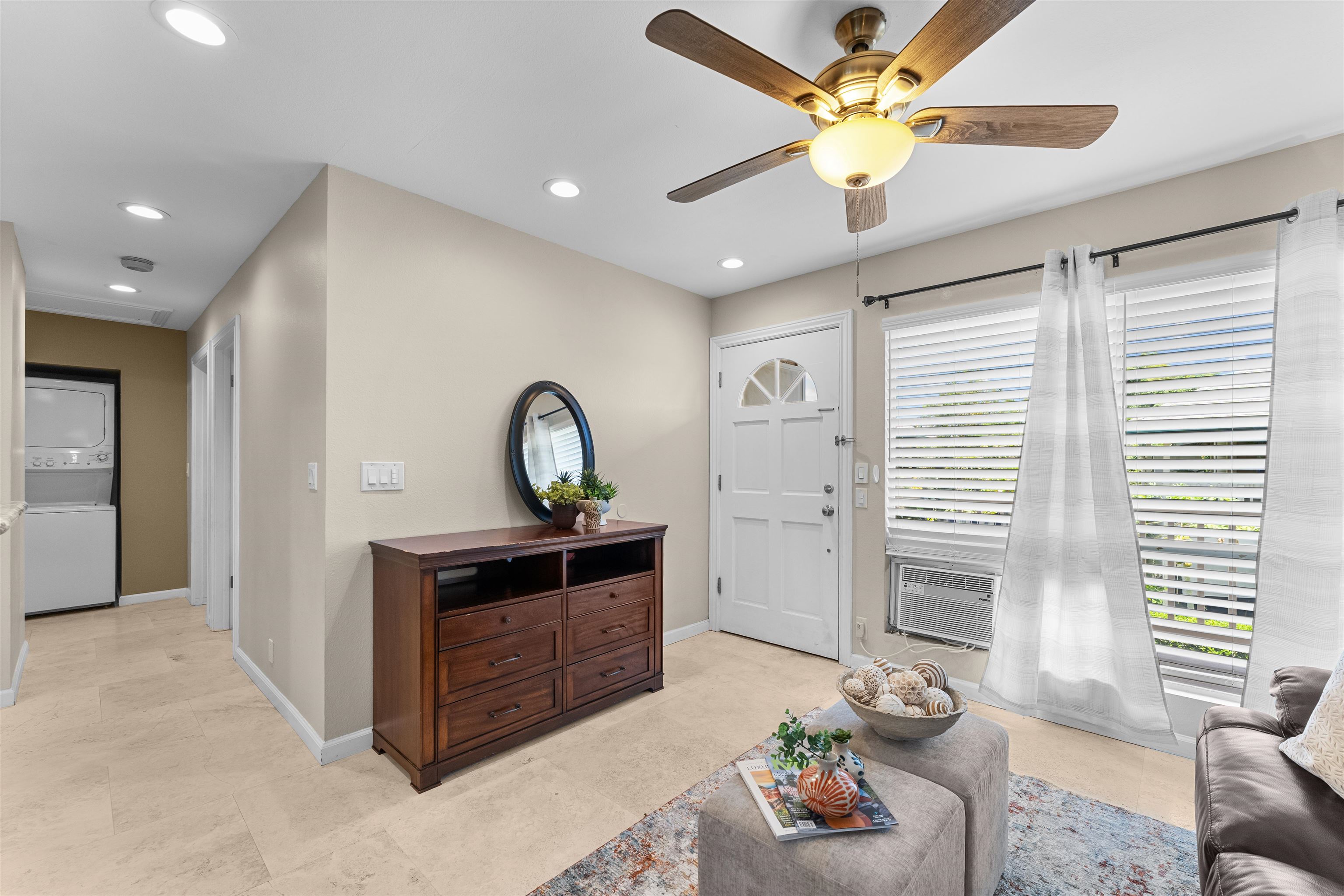 480 Kenolio Road, Unit 1203 Kihei, HI 96753 - Photo 5 of 17 a living room with furniture