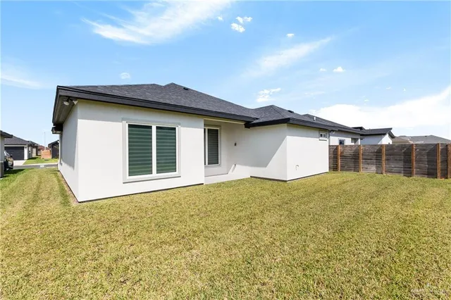 a house view with a garden space