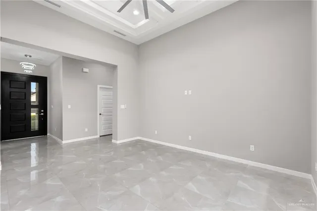 an empty room with fan