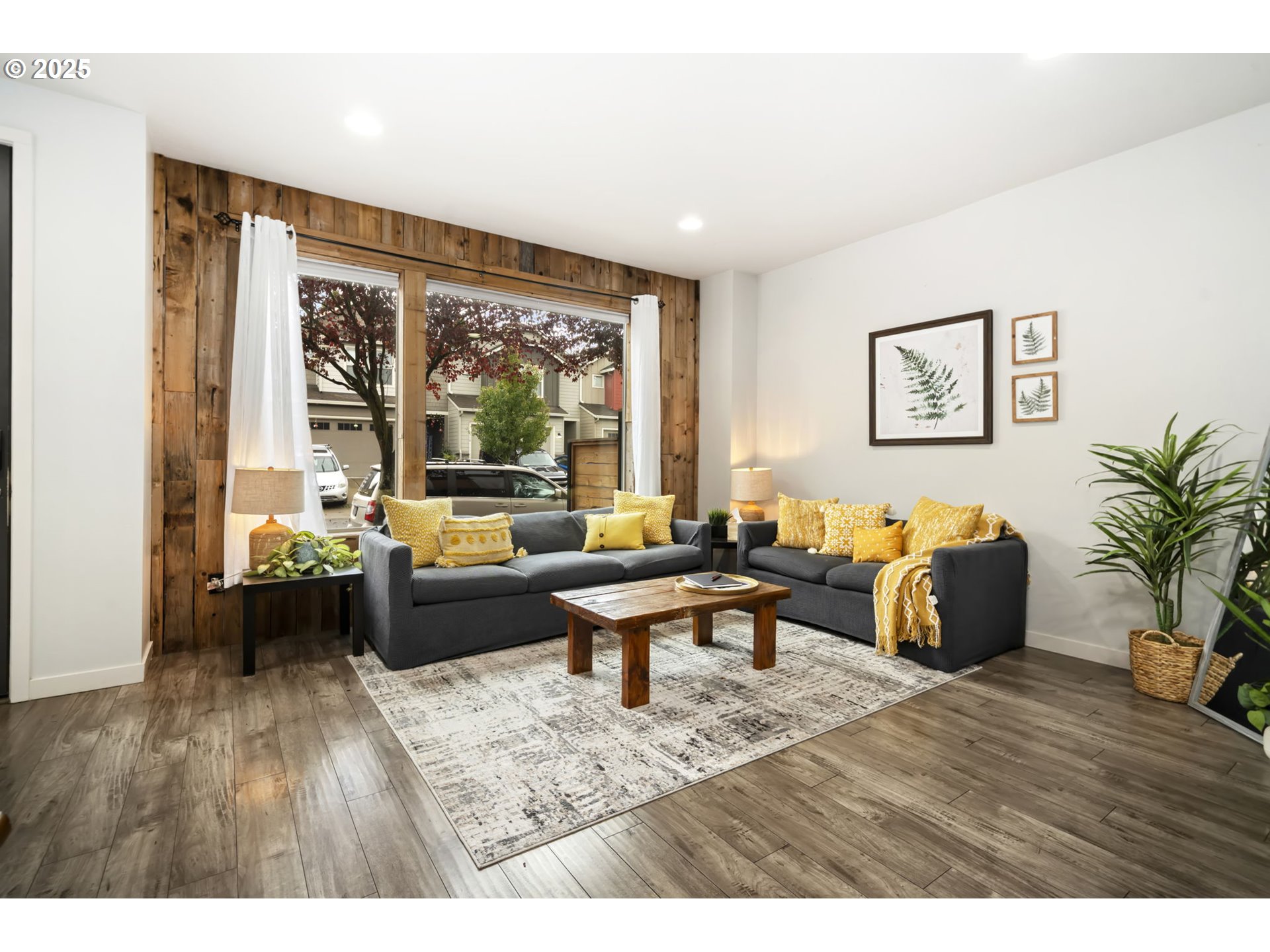 125 North 44th Place Ridgefield, WA 98642 - Photo 12 of 47 a living room with furniture and a large window