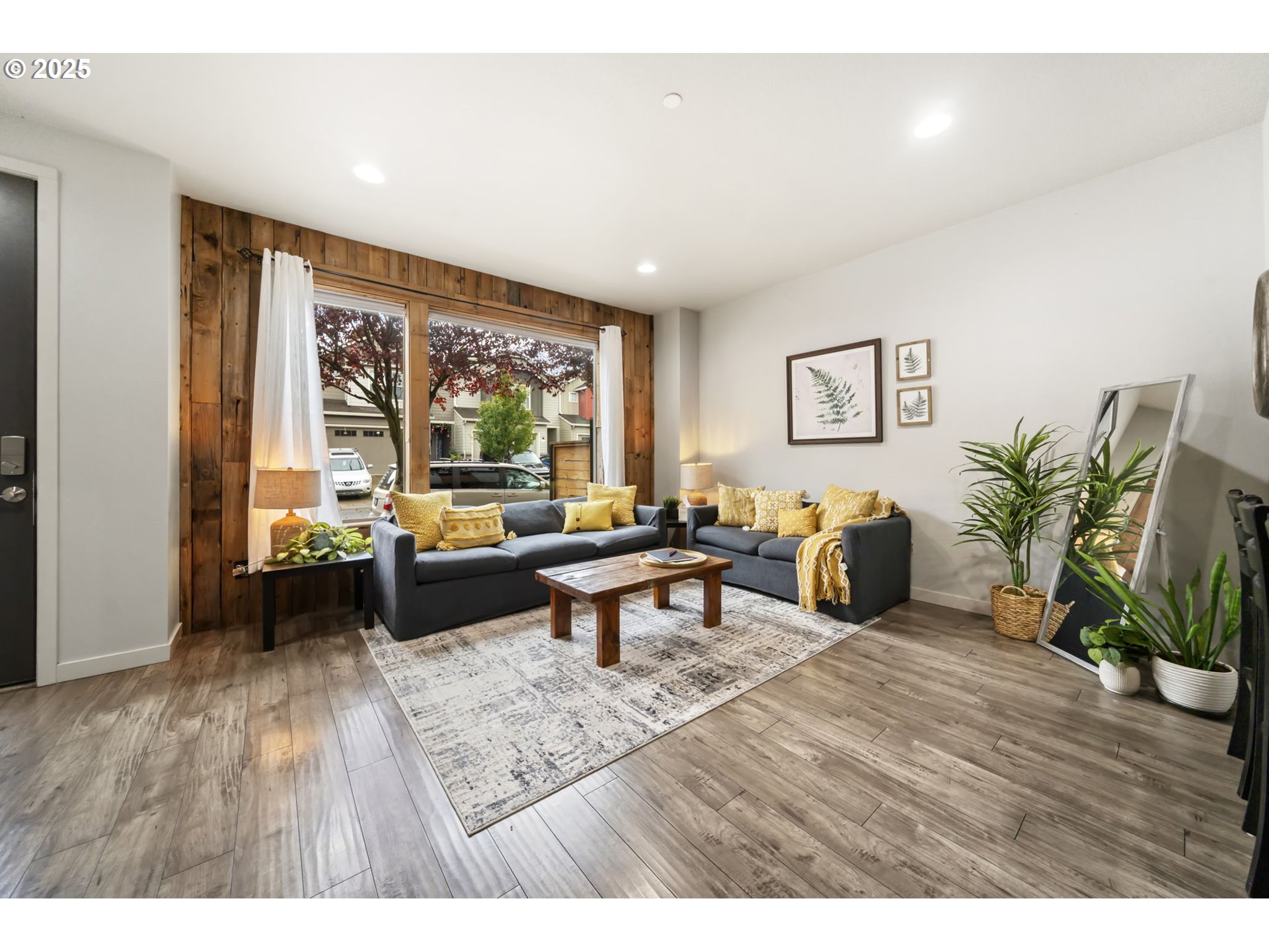 125 North 44th Place Ridgefield, WA 98642 - Photo 13 of 47 a living room with furniture and a large window
