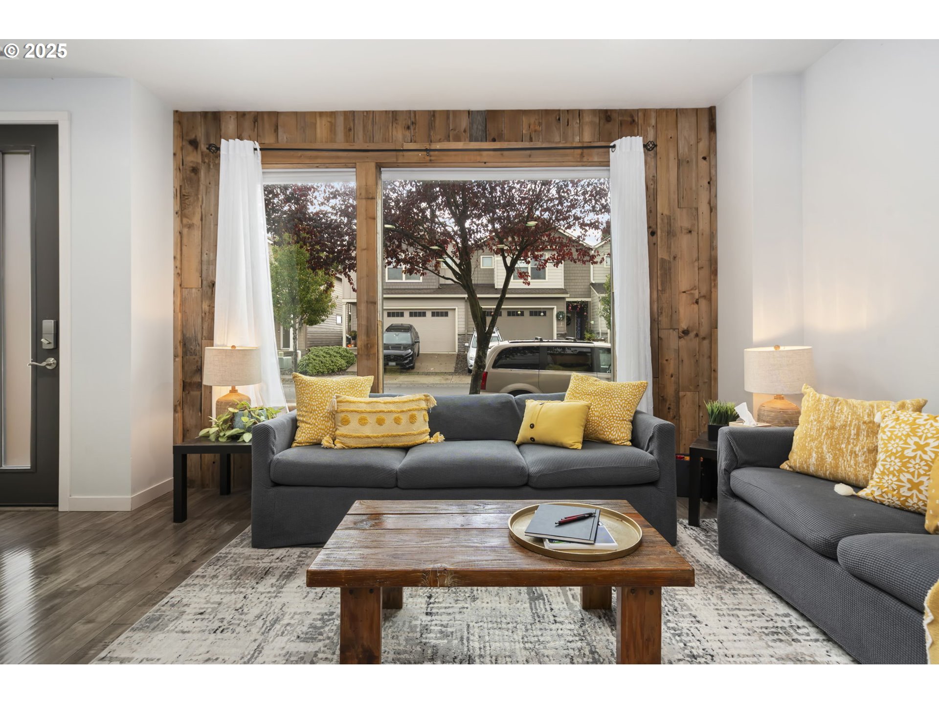 125 North 44th Place Ridgefield, WA 98642 - Photo 14 of 47 a living room with furniture and a large window