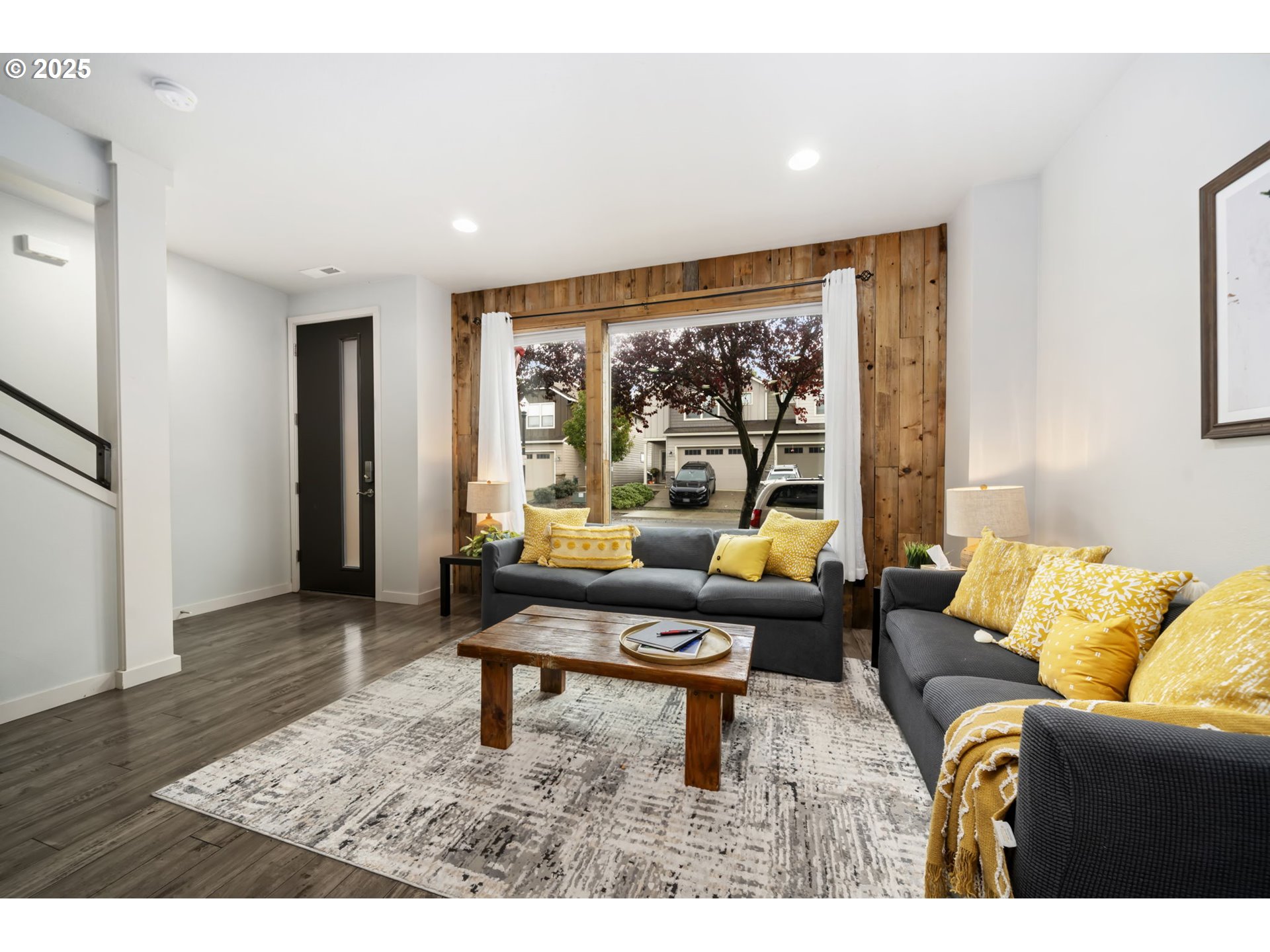 125 North 44th Place Ridgefield, WA 98642 - Photo 15 of 47 a living room with furniture and a large window