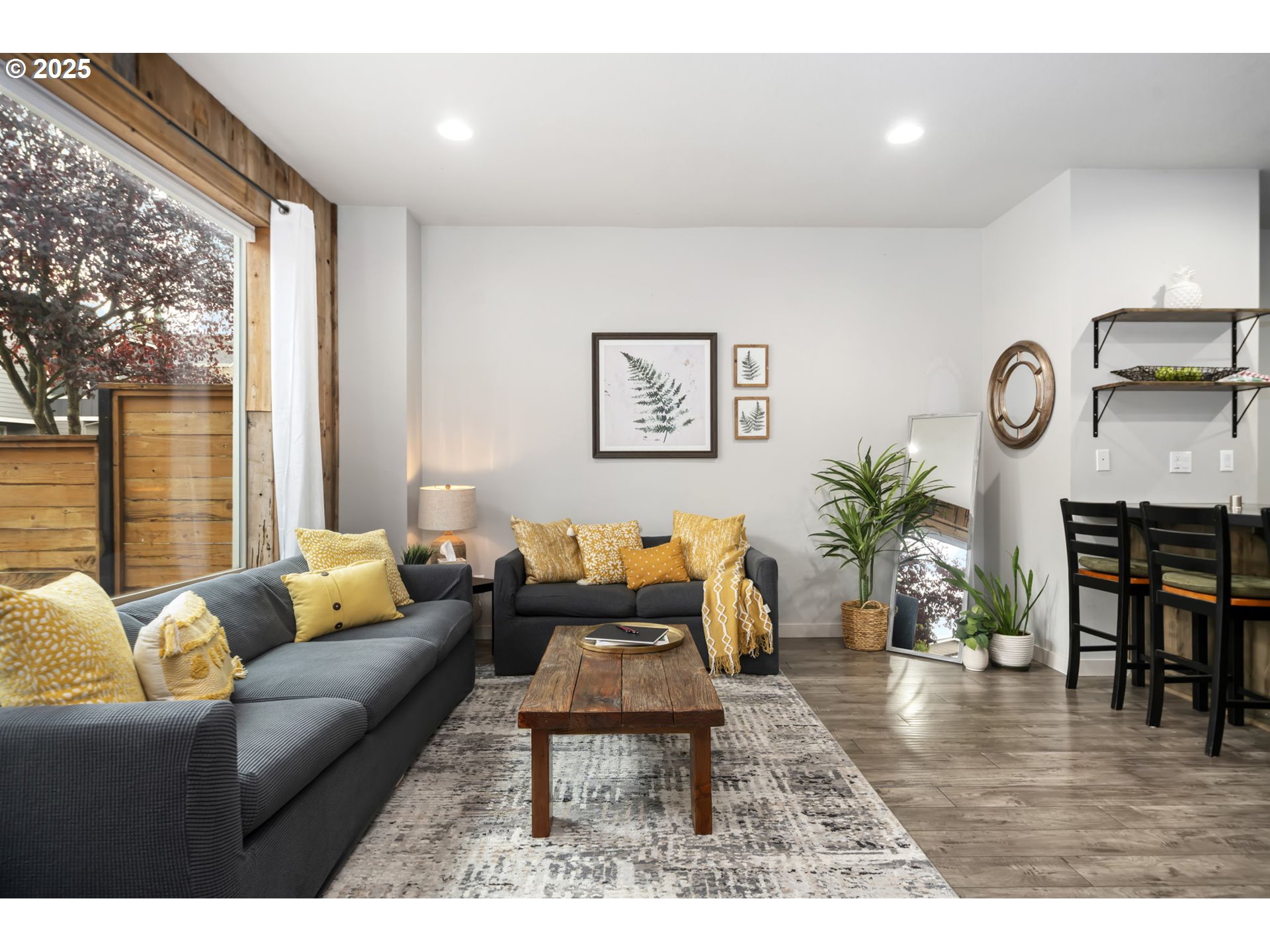 125 North 44th Place Ridgefield, WA 98642 - Photo 16 of 47 a living room with furniture and wooden floor