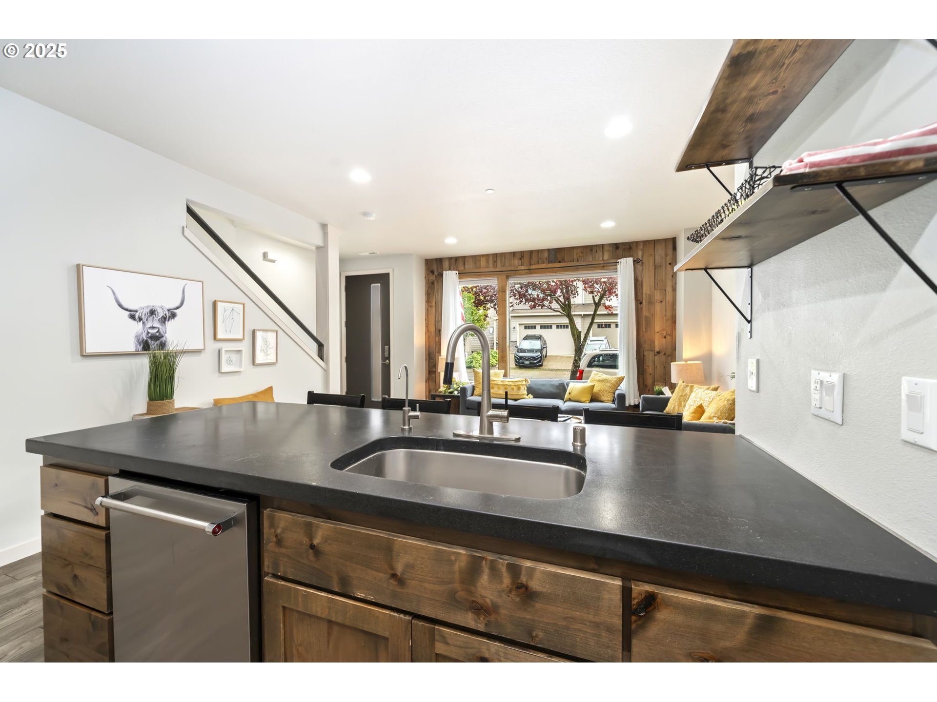 125 North 44th Place Ridgefield, WA 98642 - Photo 23 of 47 a kitchen with stainless steel appliances a sink window and cabinets