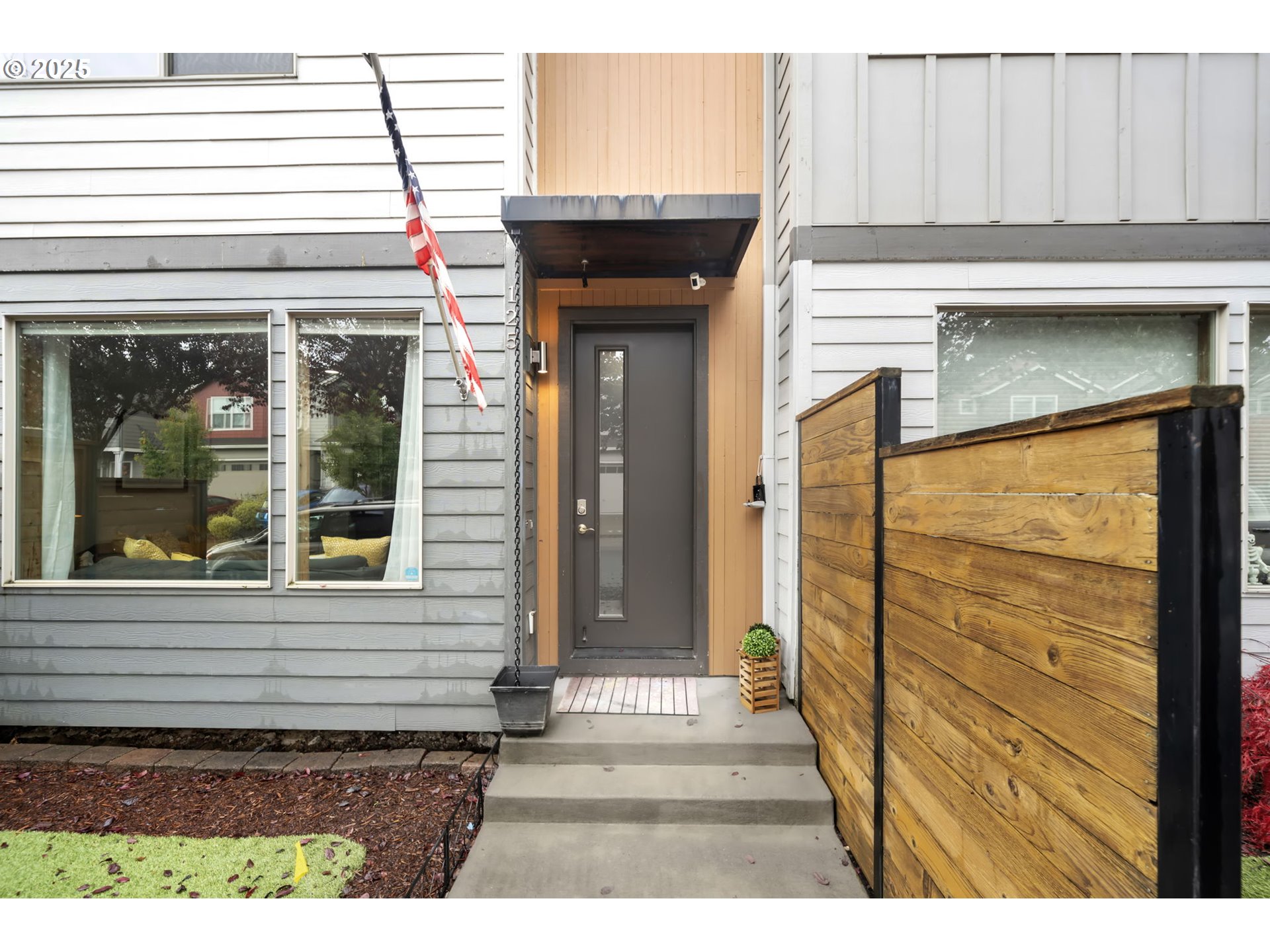 125 North 44th Place Ridgefield, WA 98642 - Photo 3 of 47 a view of a entryway door front of house