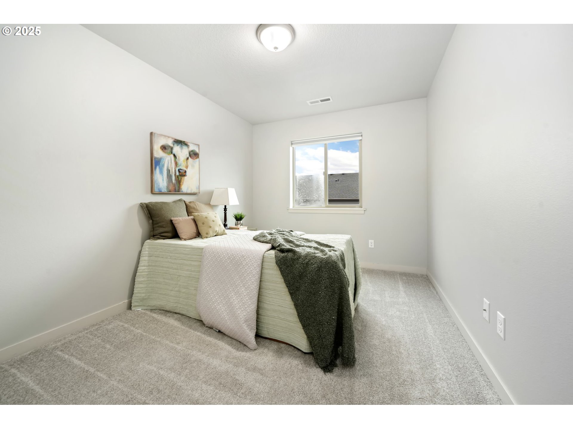 125 North 44th Place Ridgefield, WA 98642 - Photo 34 of 47 a bedroom with a bed and a window