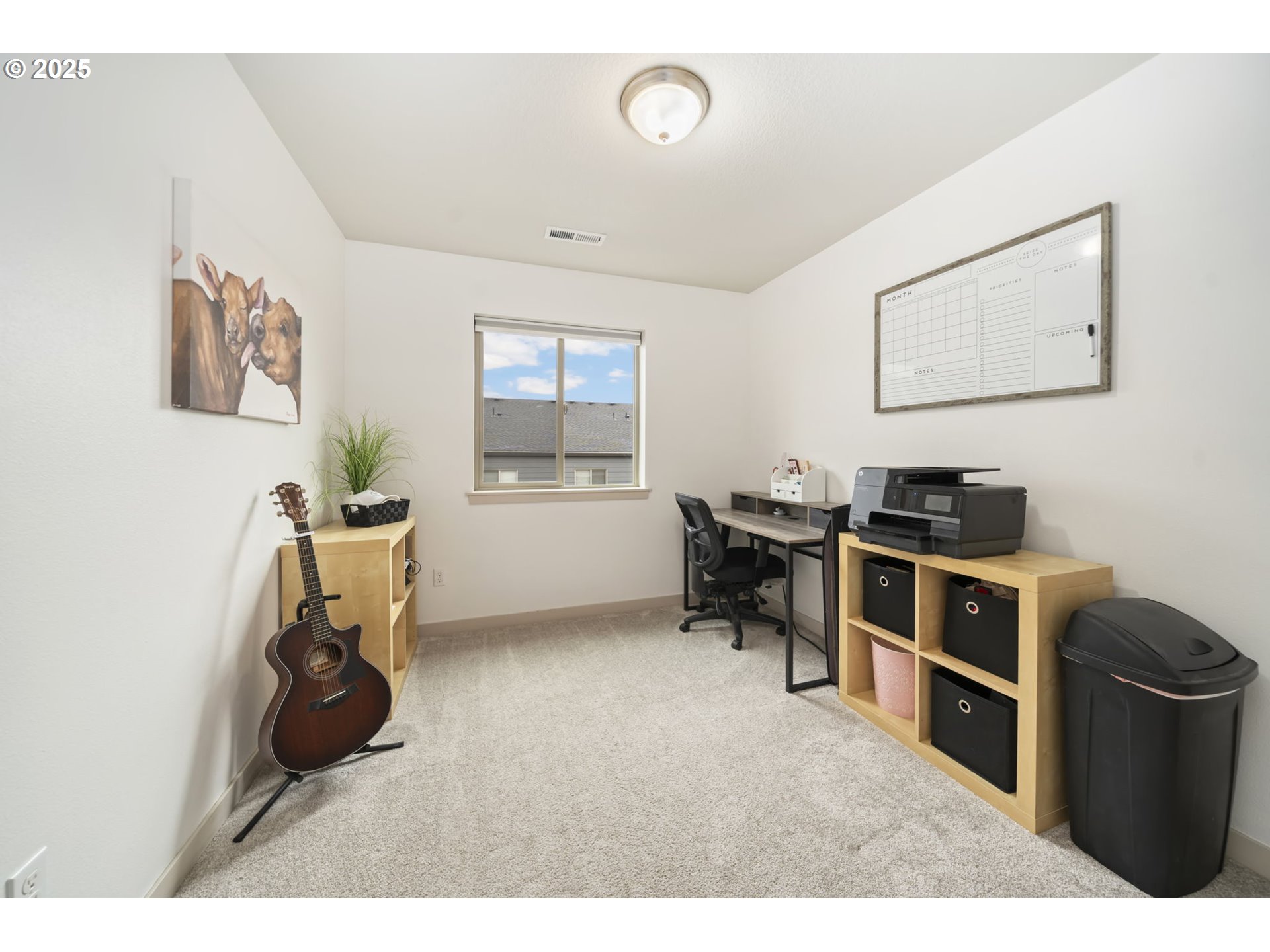 125 North 44th Place Ridgefield, WA 98642 - Photo 38 of 47 a living room with furniture and a window