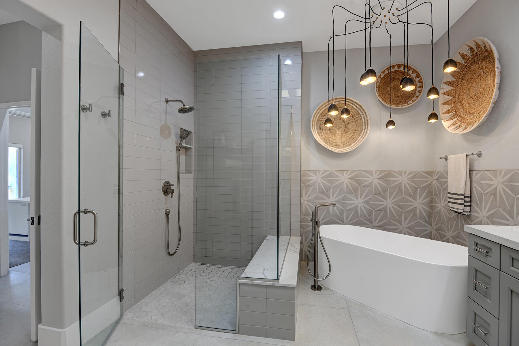 75 North Kavenish Drive Rancho Mirage, CA 92270 - Photo 21 of 41 a bathroom with a sink and mirror with bathtub