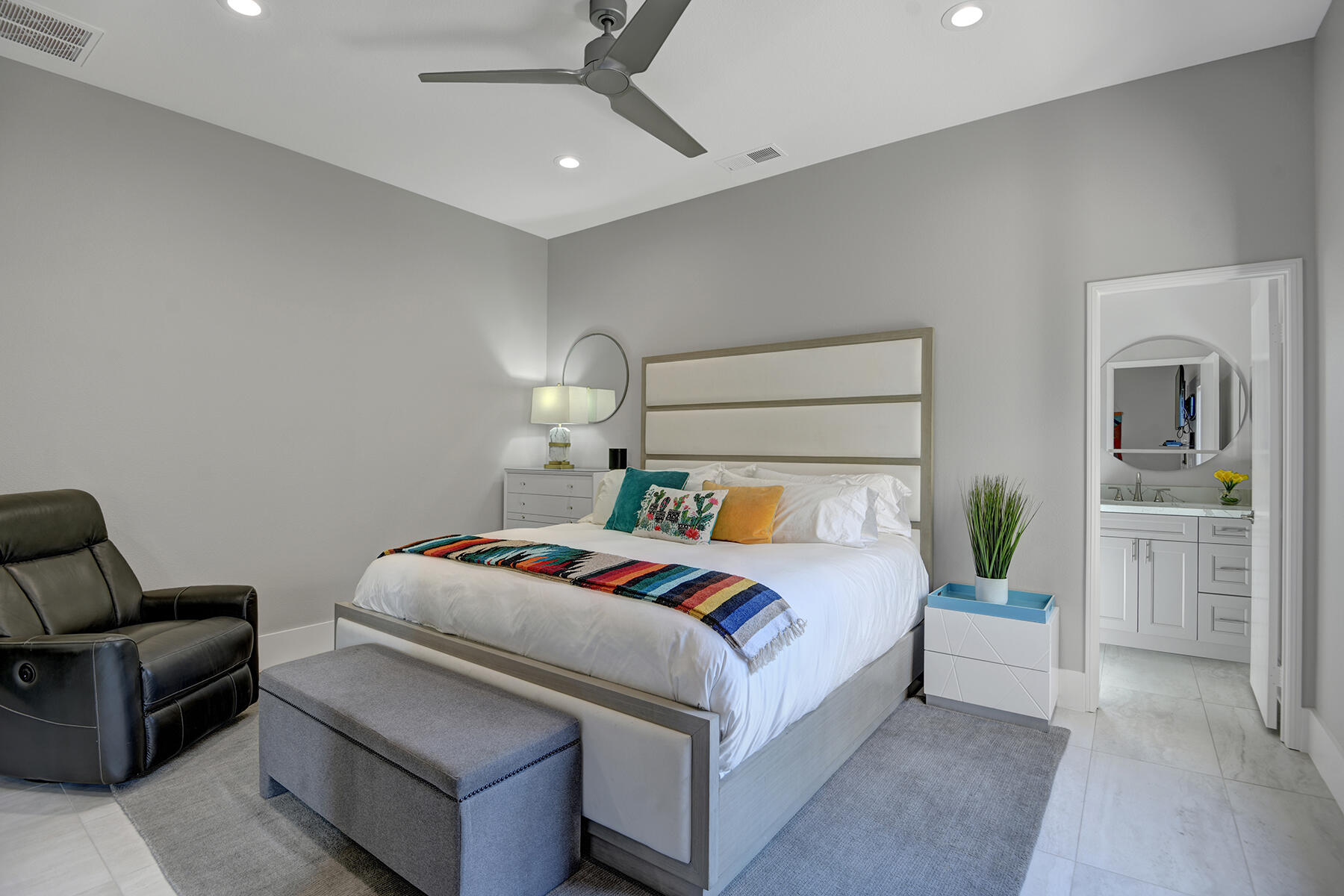 75 North Kavenish Drive Rancho Mirage, CA 92270 - Photo 28 of 41 a bedroom with a bed couch and window