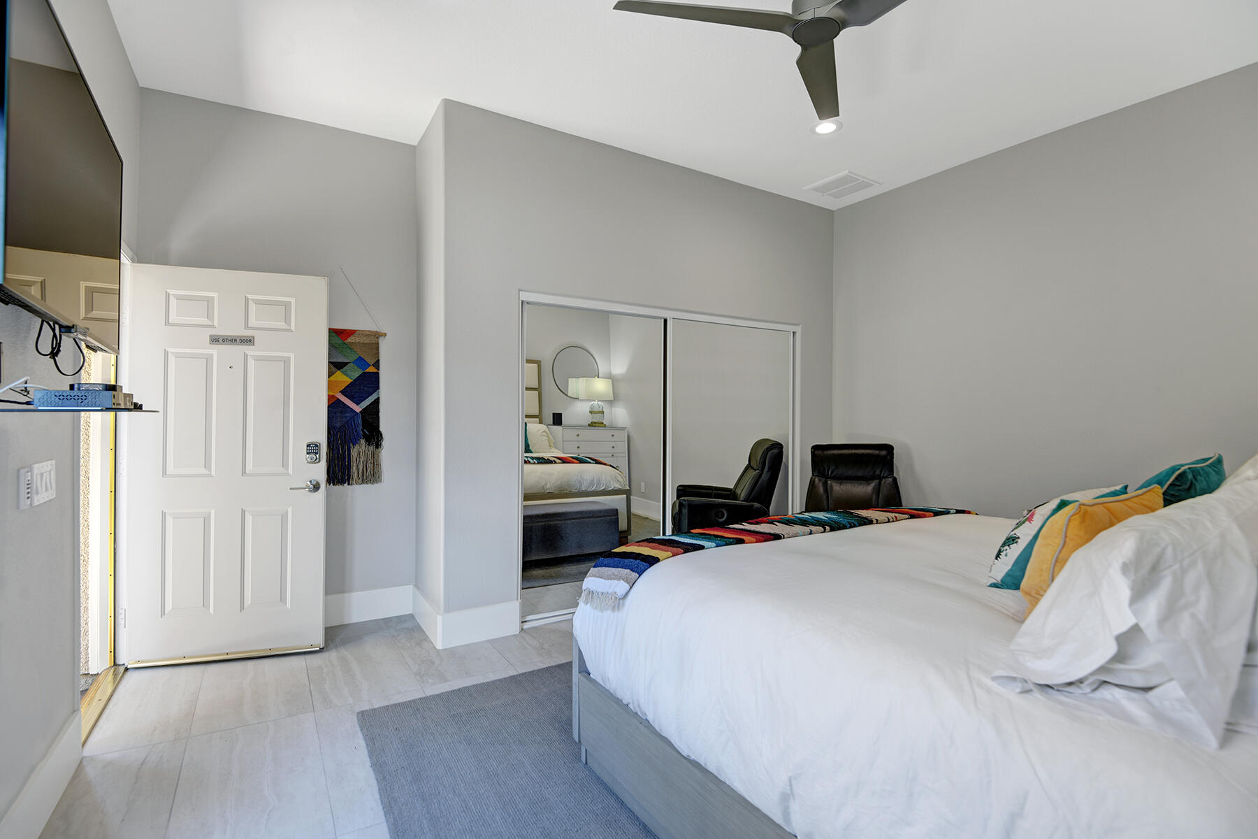 75 North Kavenish Drive Rancho Mirage, CA 92270 - Photo 29 of 41 a bedroom with a bed and a flat tv screen