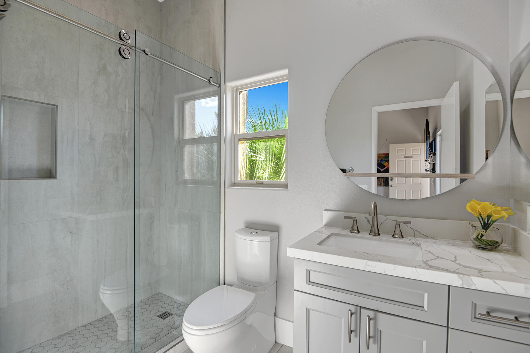 75 North Kavenish Drive Rancho Mirage, CA 92270 - Photo 30 of 41 a bathroom with a sink a toilet and shower