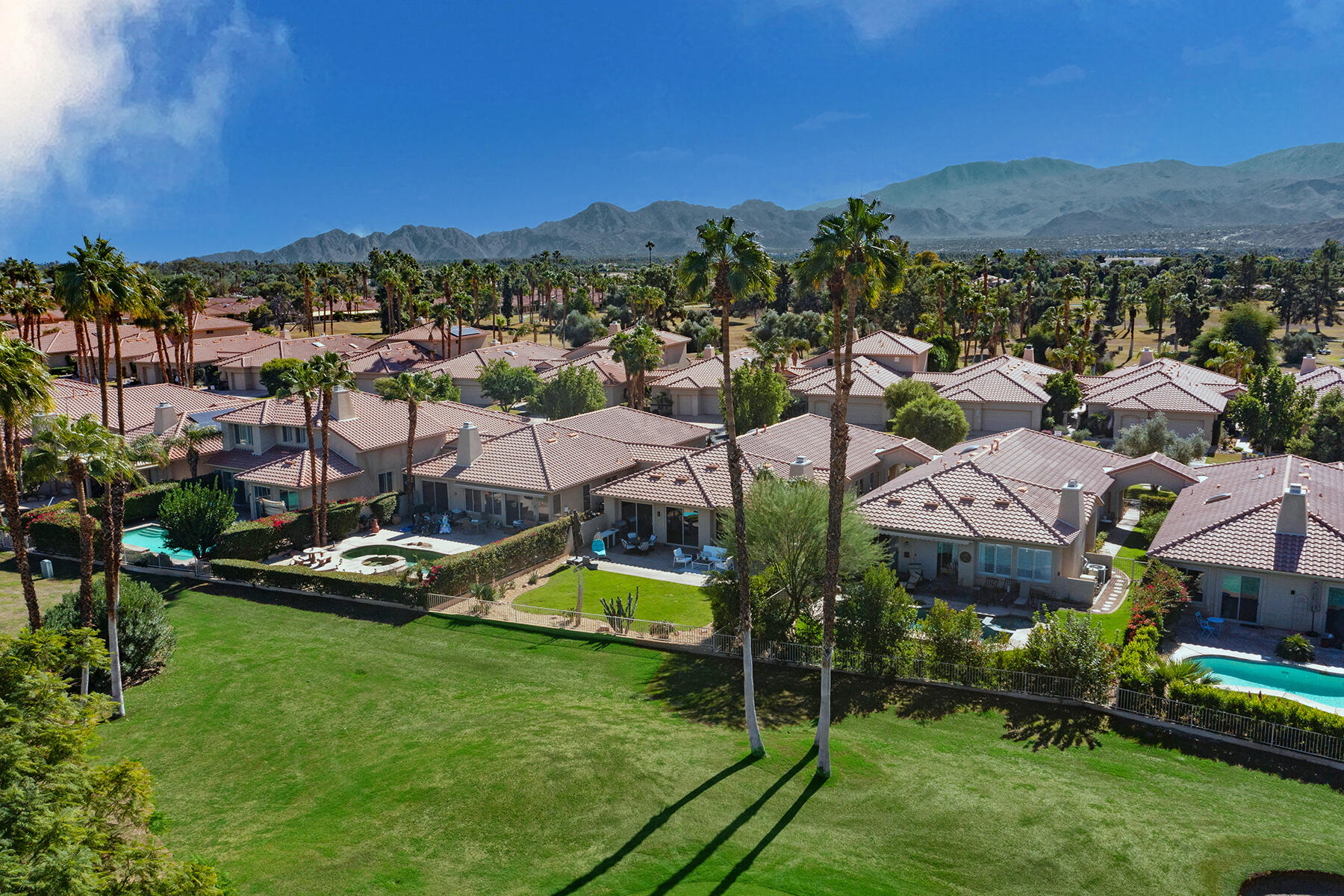 75 North Kavenish Drive Rancho Mirage, CA 92270 - Photo 3 of 41 a view of a town with big houses
