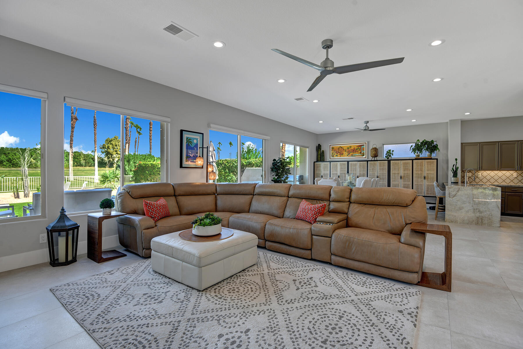 75 North Kavenish Drive Rancho Mirage, CA 92270 - Photo 4 of 41 a living room with furniture and a large window