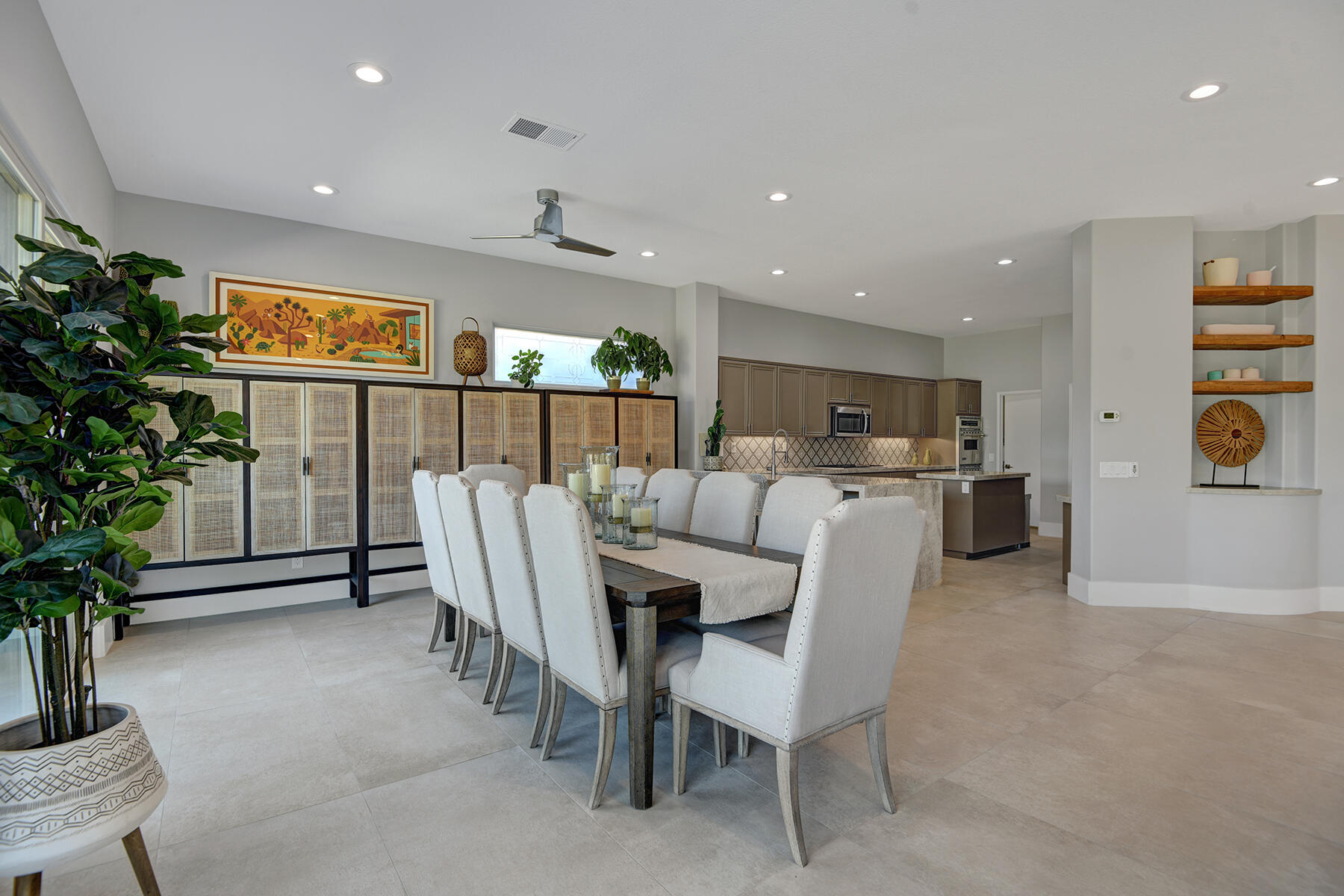 75 North Kavenish Drive Rancho Mirage, CA 92270 - Photo 10 of 41 a dining room with furniture and potted plants