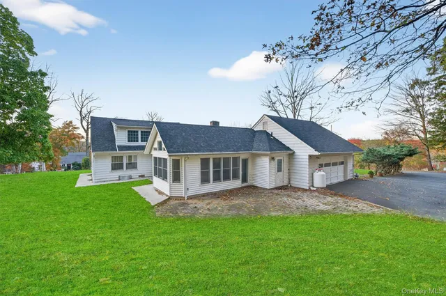 a house view with a garden space