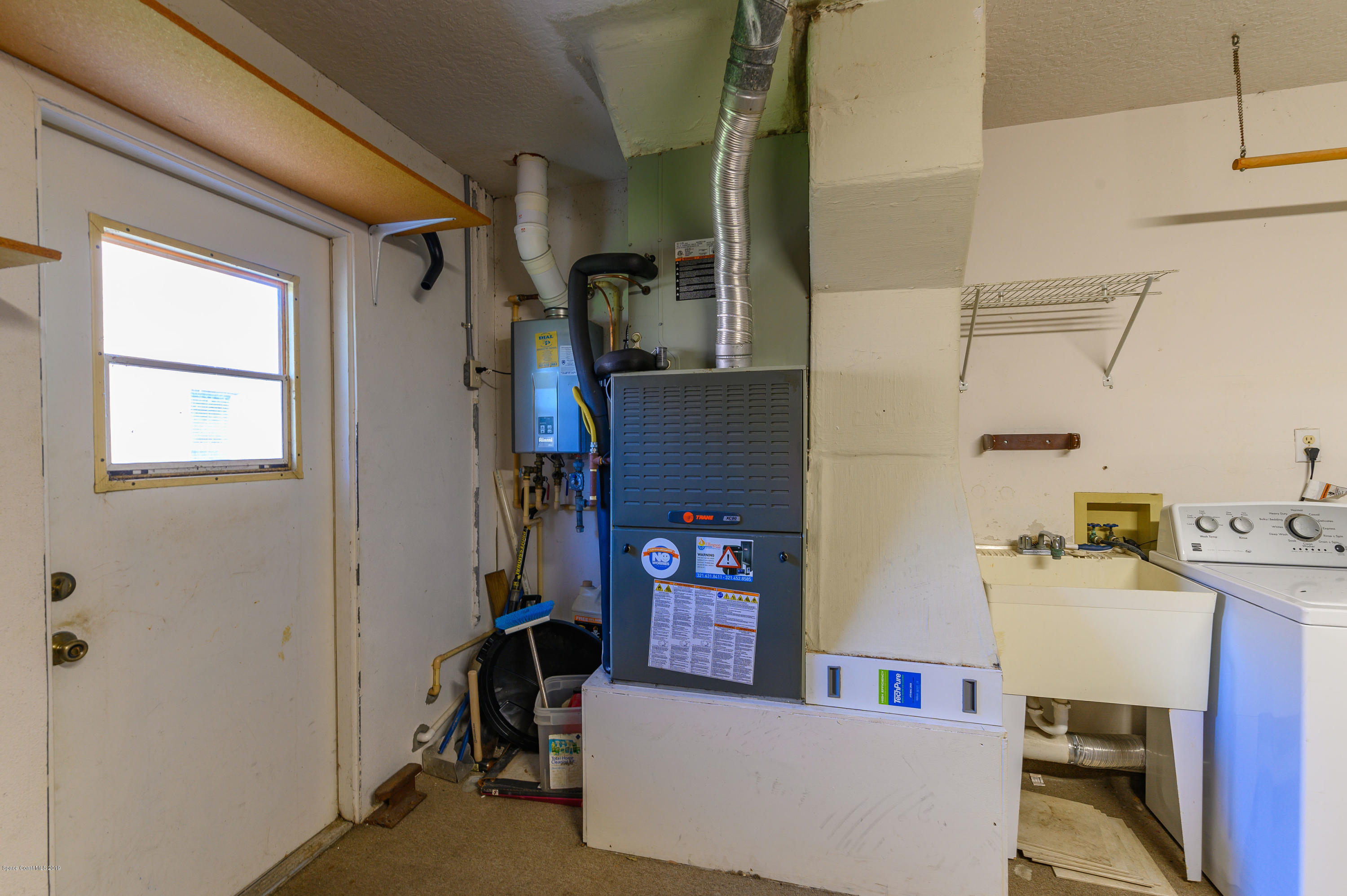 1256 Winding Meadows Road Rockledge, FL 32955 - Photo 19 of 23 a view of utility room