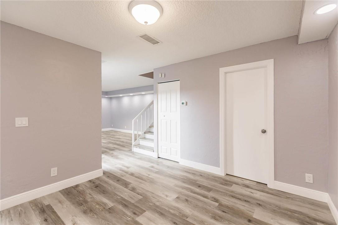 209 Woodland Road Palm Springs, FL 33461 - Photo 13 of 23 a view of empty room