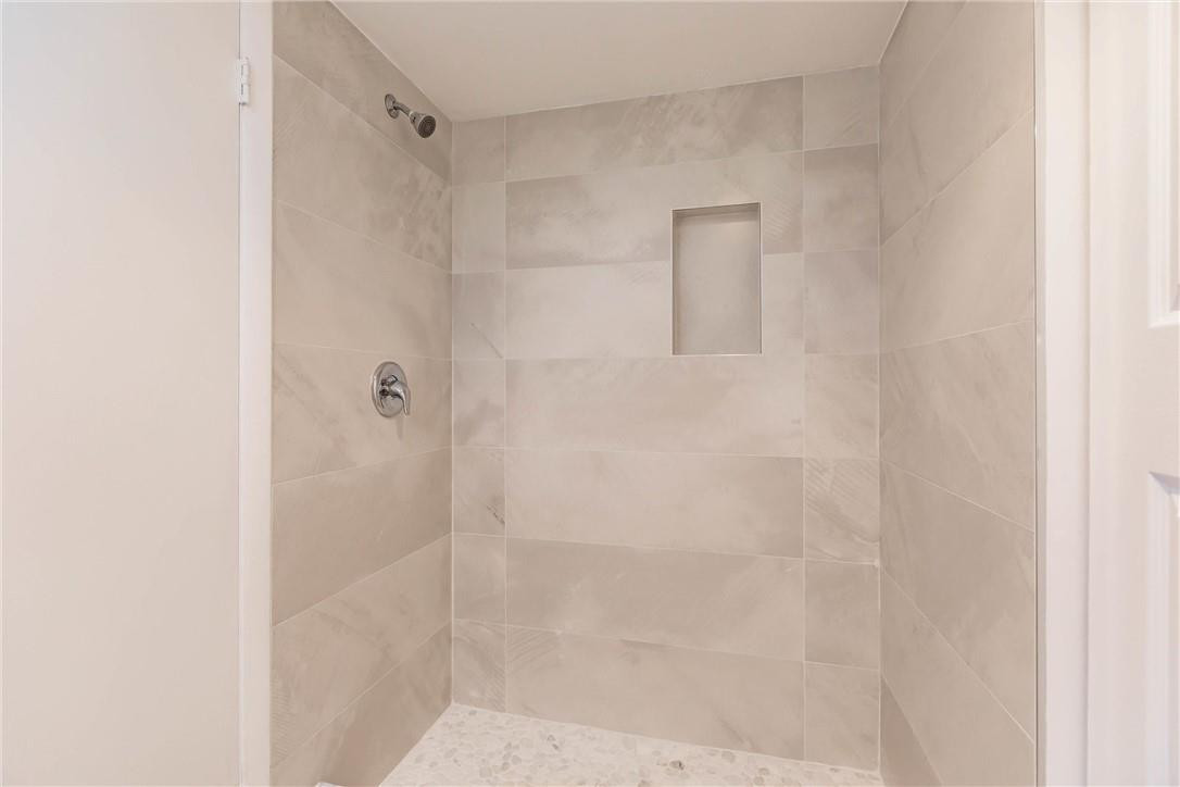 209 Woodland Road Palm Springs, FL 33461 - Photo 15 of 23 a bathroom with a shower