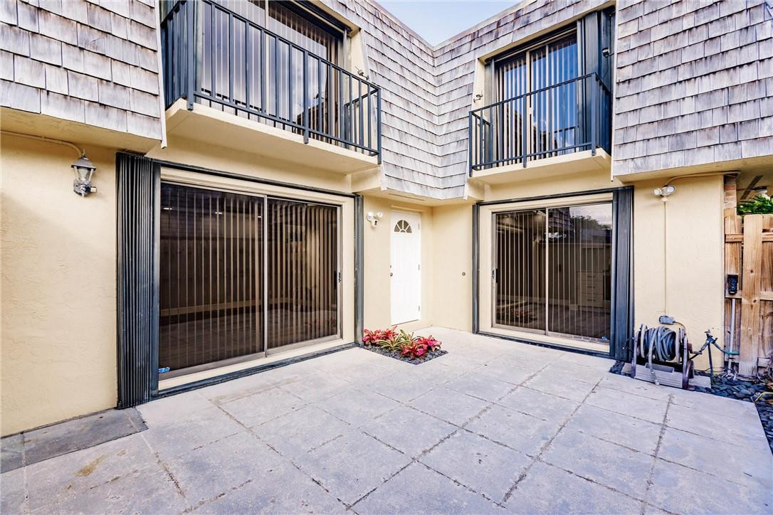 209 Woodland Road Palm Springs, FL 33461 - Photo 2 of 23 a view of a building with door